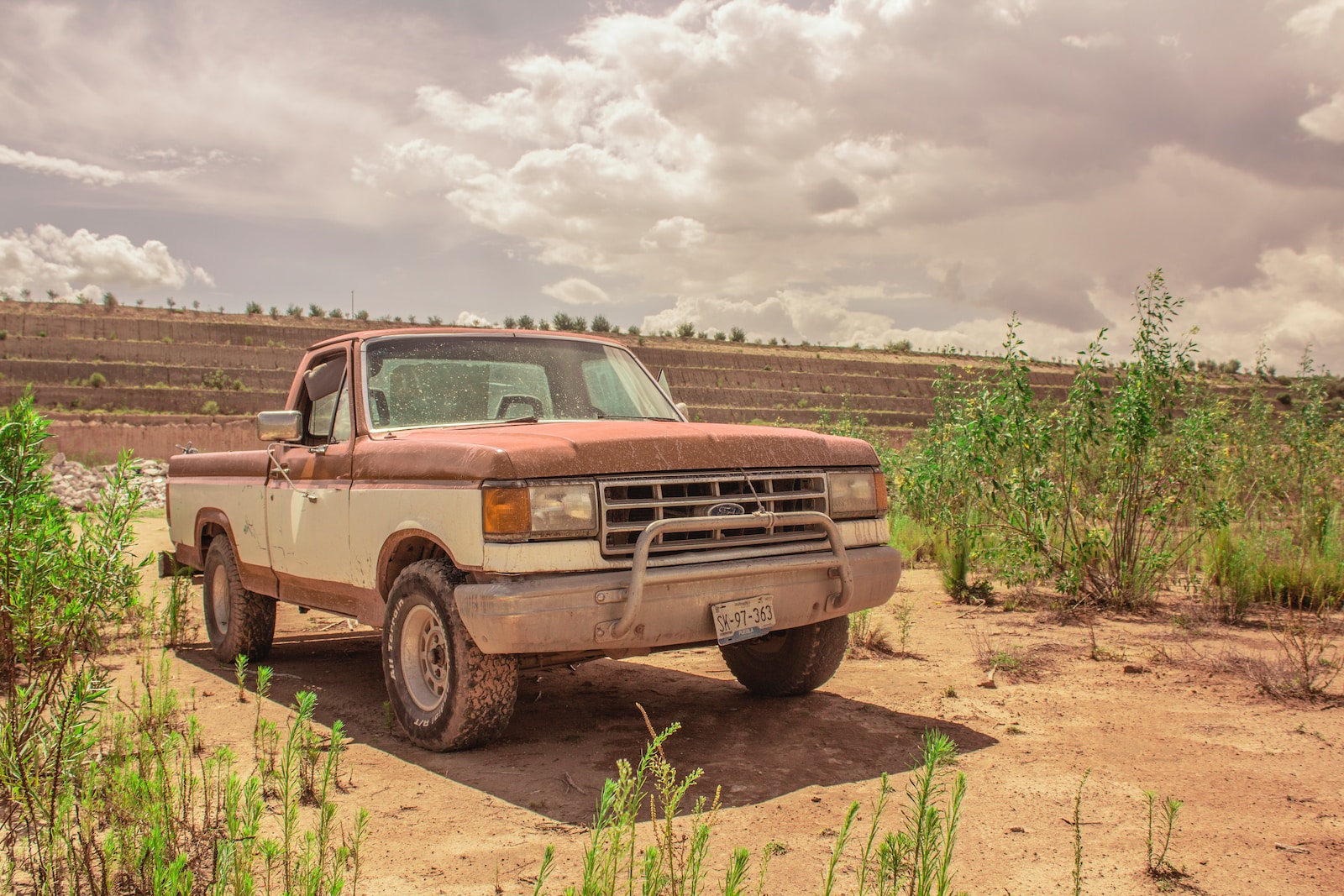 a truck parked in a field